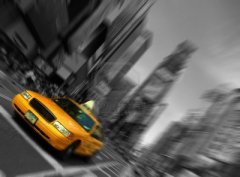 7522057-photo-new-york-city-taxi-blur-focus-motion-times-square