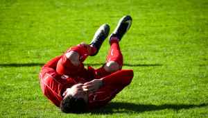 adult athlete cramps field
